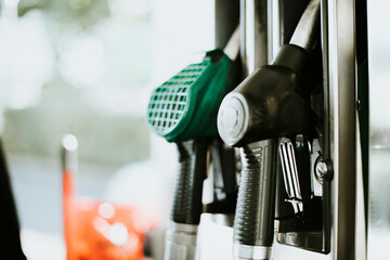 Closeup of fuel nozzles at a gas station