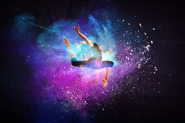 Fototapeta na wymiar Female dancer against abstract colourful background