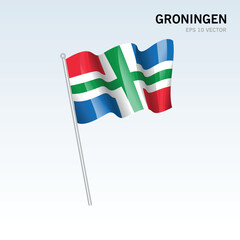 Waving flag of Groningen provinces of Netherlands isolated on gray background