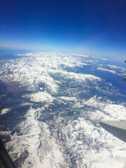 Mountain range aerial view from airplane window
