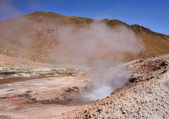 Geyser eruption along the Rio Blanco, El Tatio, San Pedro de Atacama, Chile