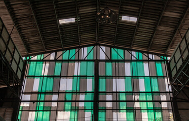 Translucent tile sheet wall colorful inside the warehouse. For the warehouse area that needs light to pass through. Focus and blur.