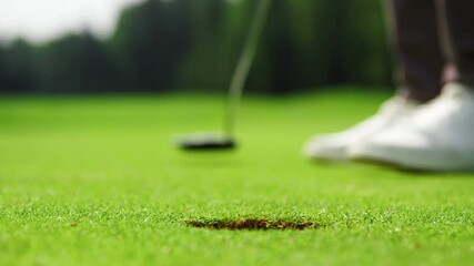 Golf player hitting a golf ball