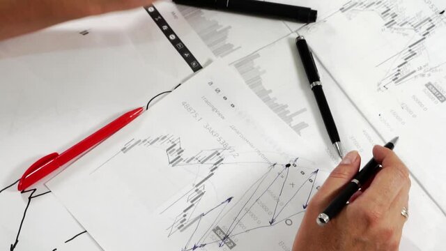 Work desk with papers and stationery.