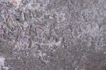 Old dirty wall close up. Grunge abstract photo background.  Beautiful stone texture pattern.

