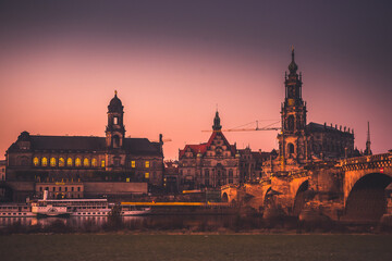 Dresden city skyline at Elbe River and Augustus Bridge at sunset, Dresden, Saxony, Germany