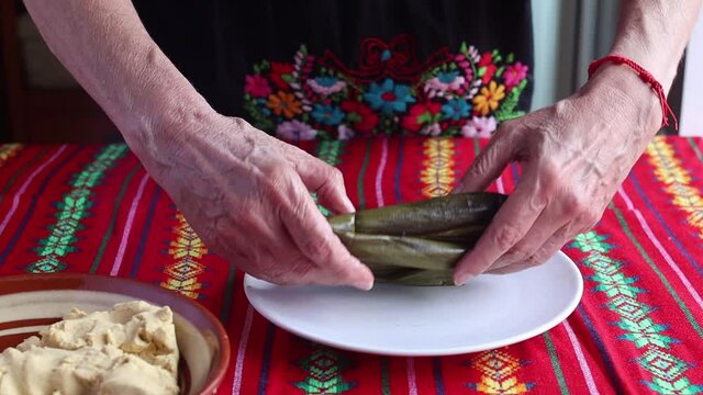 Tamales chiapanecos: tamal is a traditional meal from mexican cuisine. This variety with banana leaves is traditional from Oaxaca and Chiapas, Mexico