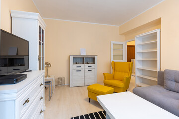 Interior of an apartment living room with furniture