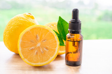lemon essential  oil  on woden background