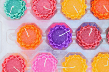 Many colored candles look like flowers.