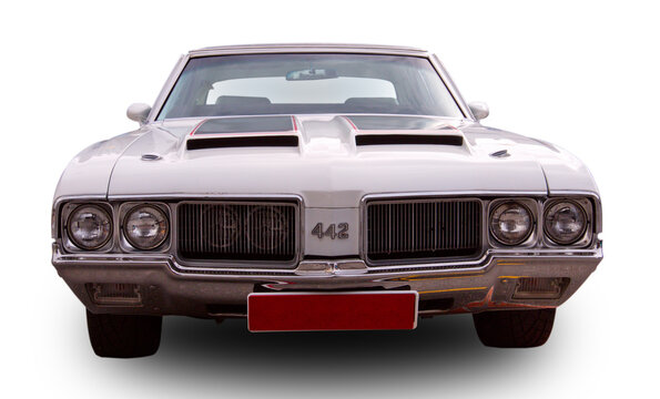Classical American vintage car Oldsmobile 442 1970. Front view. White background.