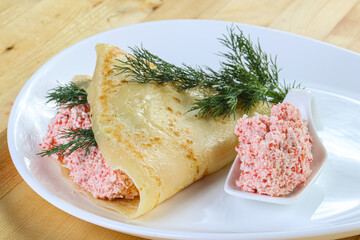 Pancake with crab and cream