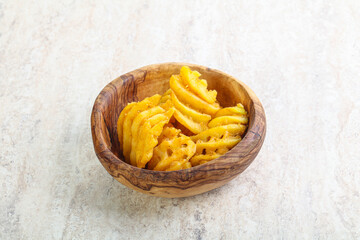 Fried potato slice in the bowl