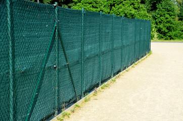 the shading fabric on the wire fence creates a private space and in a moment you have an opaque...