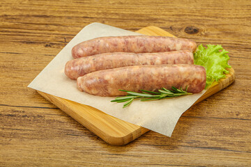 Raw pork meat sausages for grill