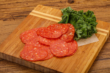 Italian spycy pepperoni sausage slices