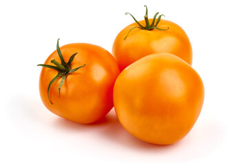 Fresh yellow tomatoes, isolated on white background.