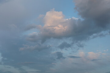 Scenic panoramic view with sunrise over the sea. Time lapse of clouds over the mountains. Natural beauty of sky and fluffy morning clouds.