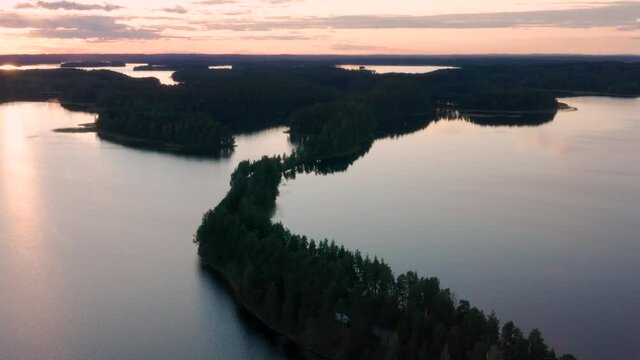 Drone aerial view of Punkaharju ridge road in sunset in saimaa lake region in Finland
