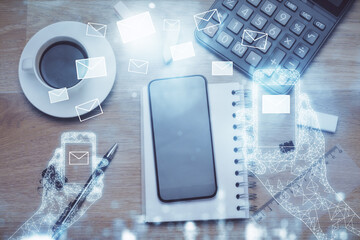 Multi exposure of envelop technology theme drawing over table with phone. Top view. Concept of...
