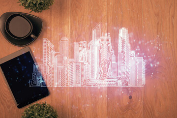 Multi exposure of smart city technology drawing over table with phone. Top view.