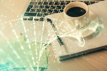 Double exposure of DNA drawing and desktop with coffee and items on table background. Concept of medical science education