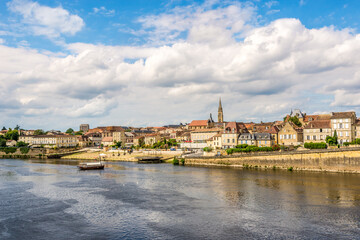 Fototapeta na wymiar View at the Bergerac town from bridge over Dordogne river - France