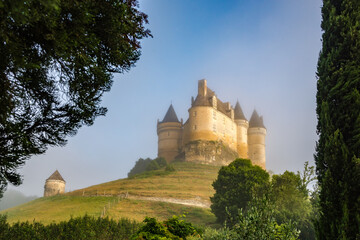 Morning haze view at the Castle of Bannes - France