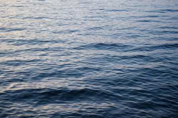 Small waves on the river. Texture of water.