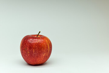 Red apple on white background