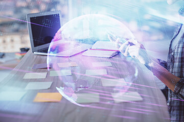 Double exposure of woman hands typing on computer and technology theme drawing. High Tech concept.