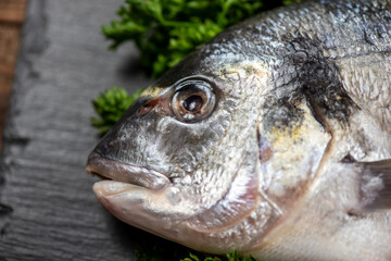 Sea bream and ingredients for cooking