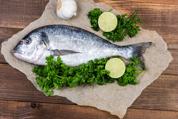 Sea bream and ingredients for cooking