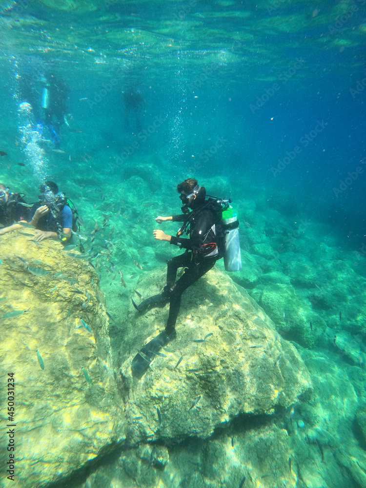 Wall mural Tourists scuba dive Mediterranian Sea. Marmaris,Turkey.