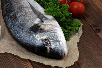 Sea bream and ingredients for cooking