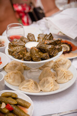 Hot dish: sarma and manti, served on the table