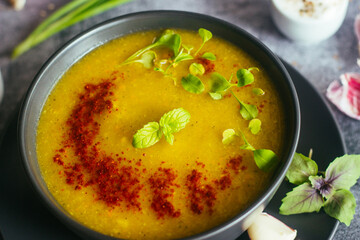 Broccoli puree soup. Delicious hot soup on a plate. Vegetarian food