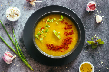Broccoli puree soup. Delicious hot soup on a plate. Vegetarian food