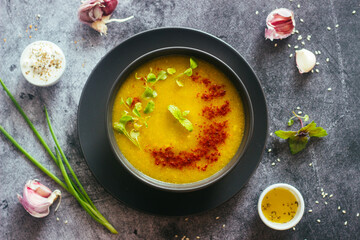 Broccoli puree soup. Delicious hot soup on a plate. Vegetarian food
