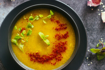 Broccoli puree soup. Delicious hot soup on a plate. Vegetarian food
