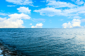 Fototapeta premium Outdoor tranquil water surface and sky natural landscape in summer, Asia