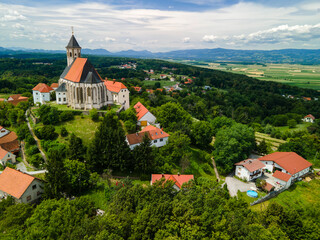 Church of The Mother of God in Ptujska Gora, Slovenia on Hill Top. Aerial Drone View