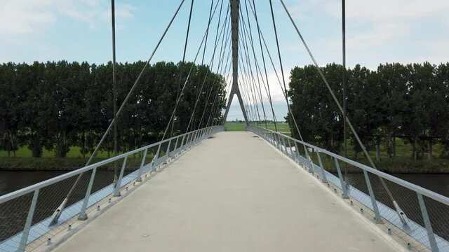Pedestrian and cyclist bridge over the Amsterdams Rijn Canal,  waterway in Nigtevecht The Netherlands. Liniebrug