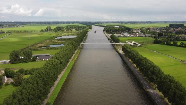 Pedestrian and cyclist bridge over the Amsterdams Rijn Canal,  waterway in Nigtevecht The Netherlands. Liniebrug