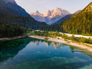 Fototapeta na wymiar Jasna Lake in Kranjka Gora Slovenia. Drone View Alpine Landscape