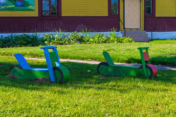 Children's playground in a kindergarten made of wooden parts from the times of the USSR. Wooden...