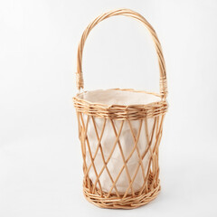 wicker basket for flower arrangement isolated on white background