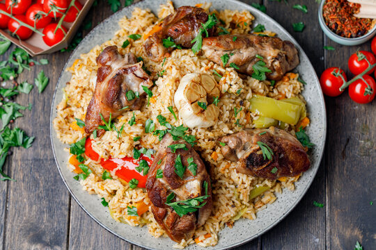Traditional Pilaf With Lamb, Vegetables, Spices On Wooden Background. Flat Lay.