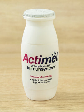 Yogurt drink on wooden background