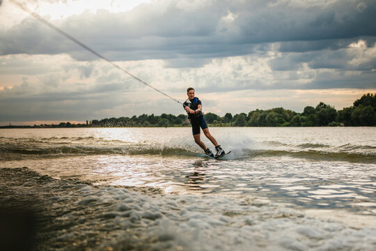 Man wakeboarding during cloudy day